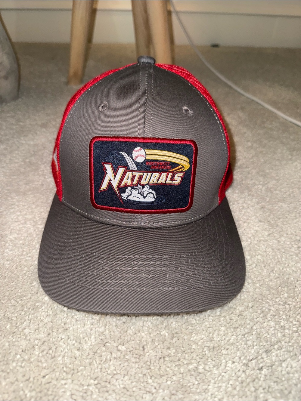 Northwest Arkansas Naturals Logo Trucker Hat in Gray and Red